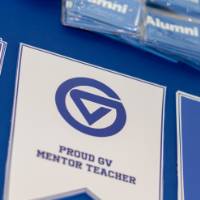 pennants on blue table cloth that read "Proud GV Mentor Teacher"